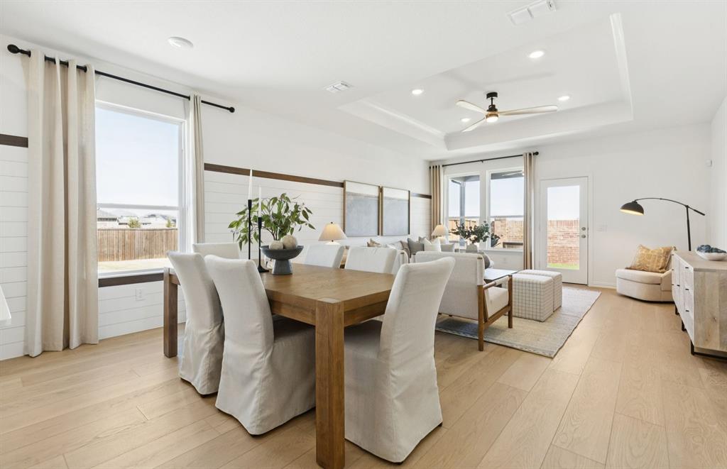 *Model Representation - Dining area off kitchen with large windows