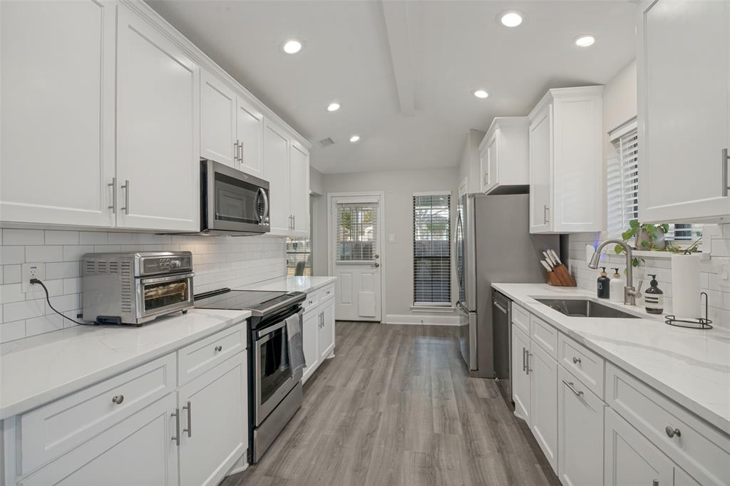 Plenty of counter space and has entrance to front patio space