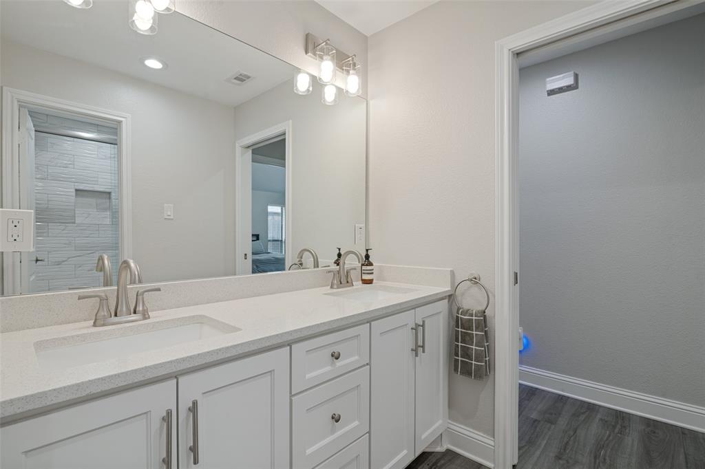 full secondary bathroom, with double sink vanity