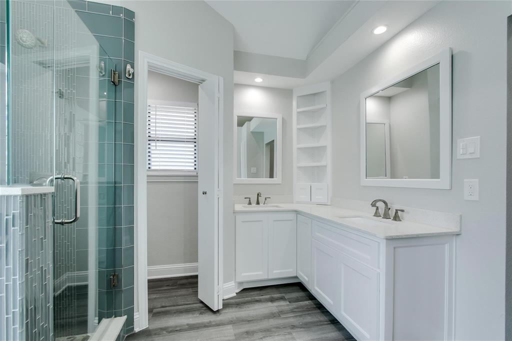 Glass tile  double sink and storage through out