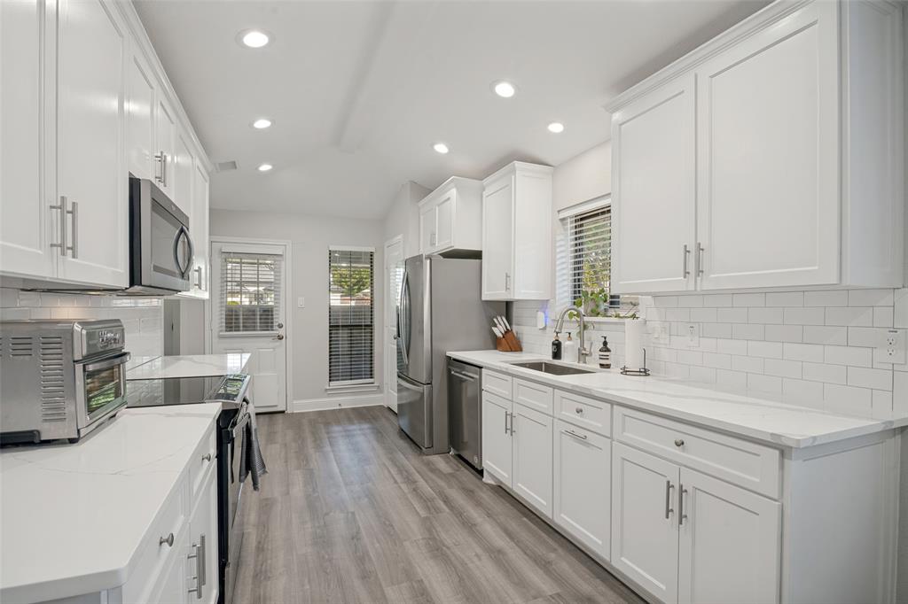 Kitchen with stainless steel appliances