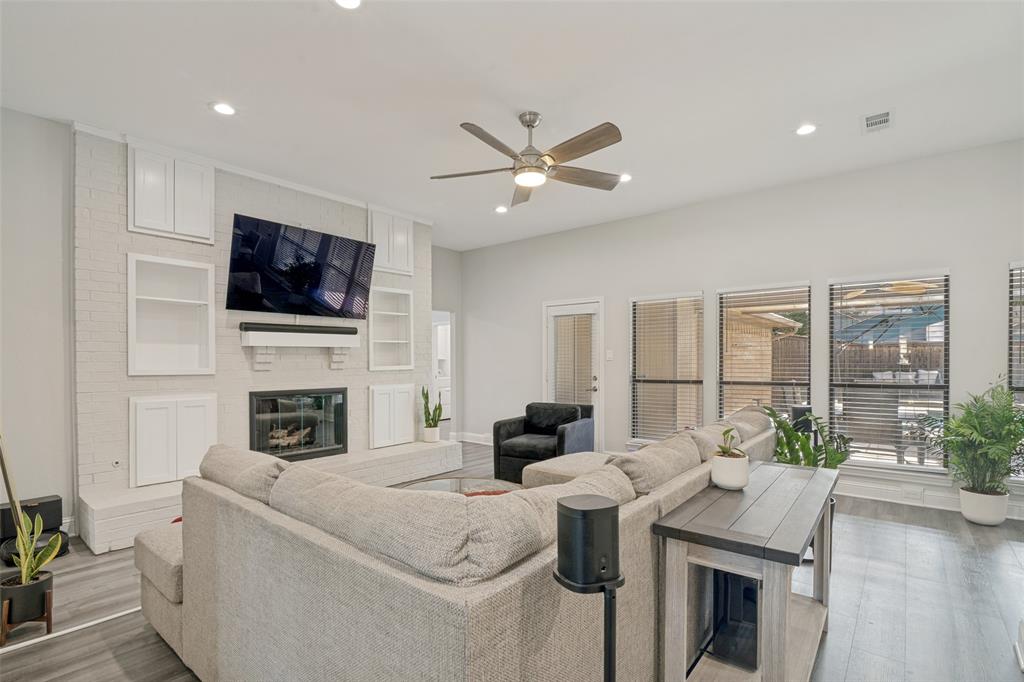 Living room also has view of the pool and door to get outside