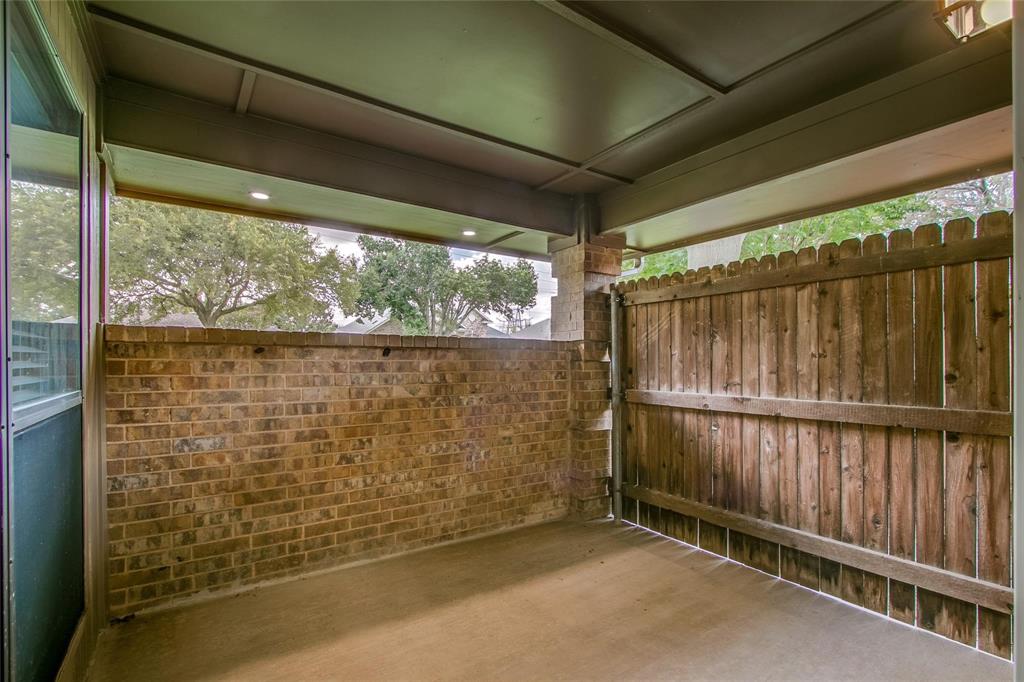 To the left of the homes, second front patio space
