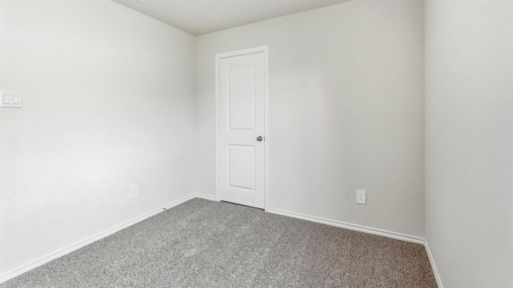 Neutral wall color and gray carpet flooring