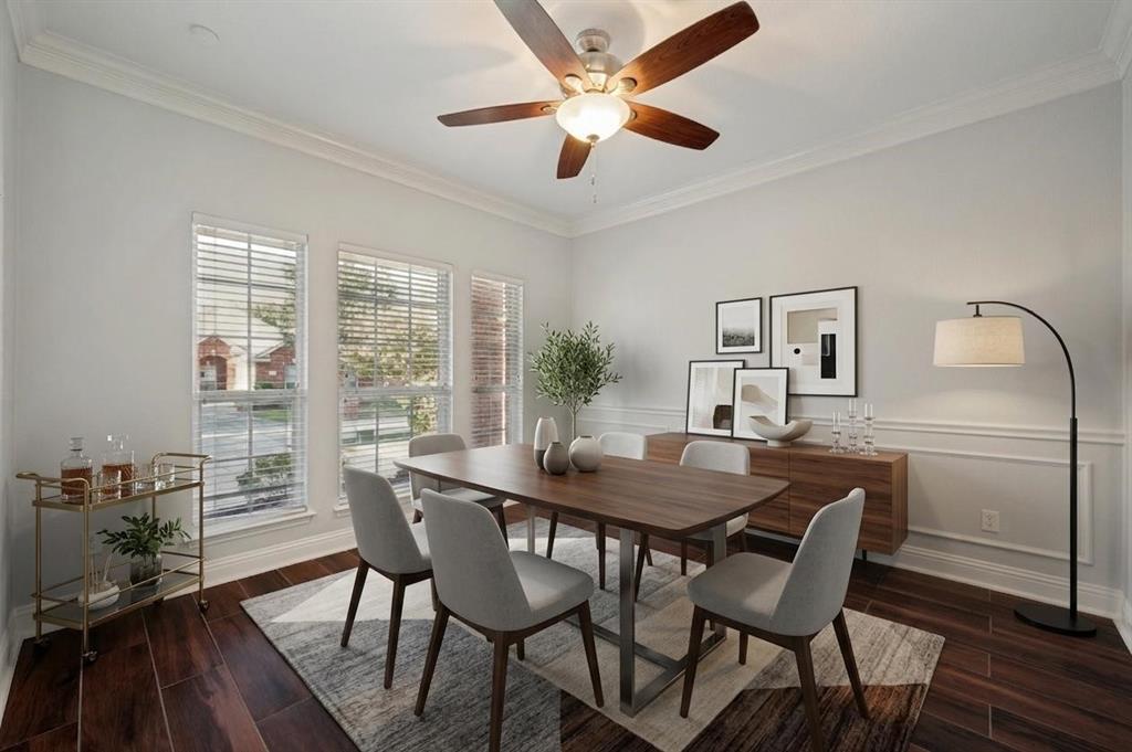 Wood-finish flooring with crown molding and wainscoting