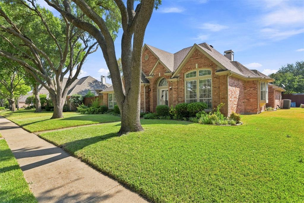 Brick exterior with multiple gables, arched entry, and bay window Brick exterior with multiple gables, arched entry, and bay window