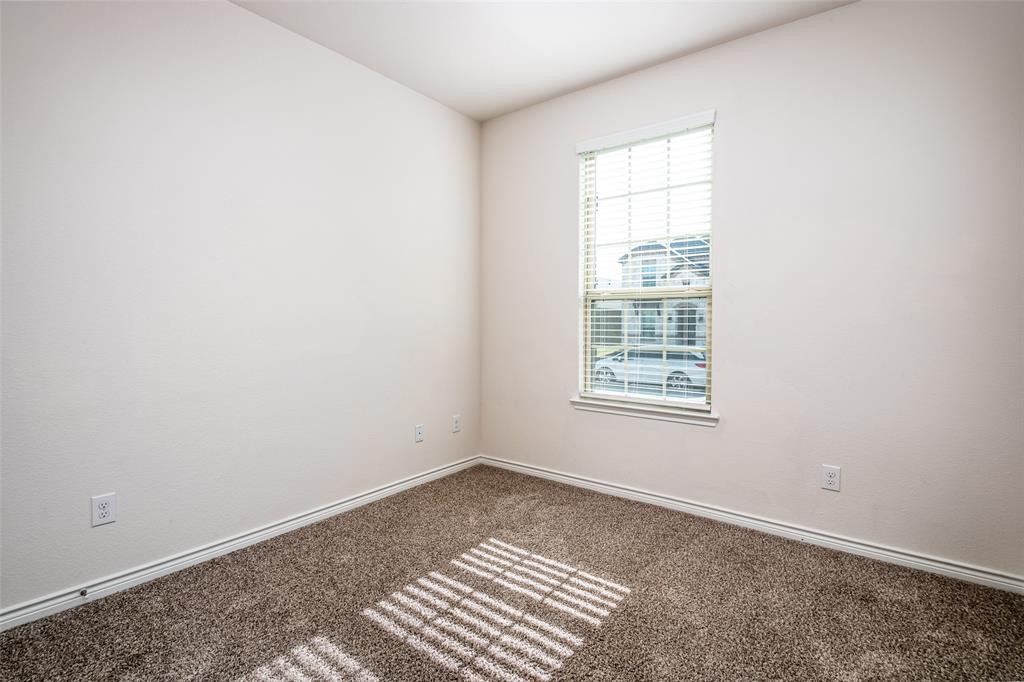 Neutral wall finishes and carpeted flooring