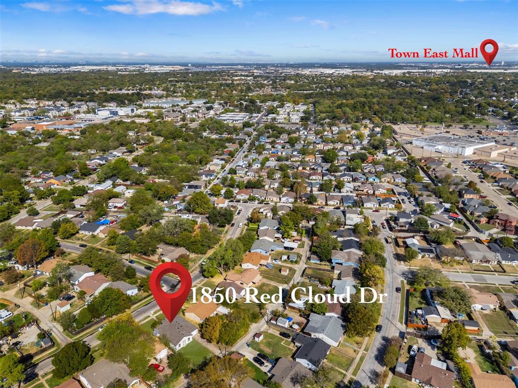 Aerial perspective of the residential lot featuring a mature tree canopy and established street infrastructure