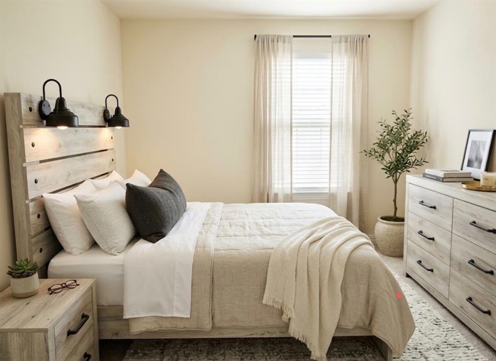 Window with blinds and sheer curtains, light-colored walls, wood-finish flooring, and a built-in headboard with attached sconces Window with blinds and sheer curtains, light-colored walls, wood-finish flooring, and a built-in headboard with attached sconces
