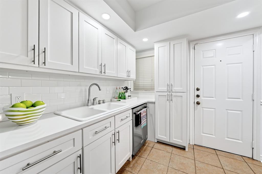 Cabinetry was added next to the door for additional storage.