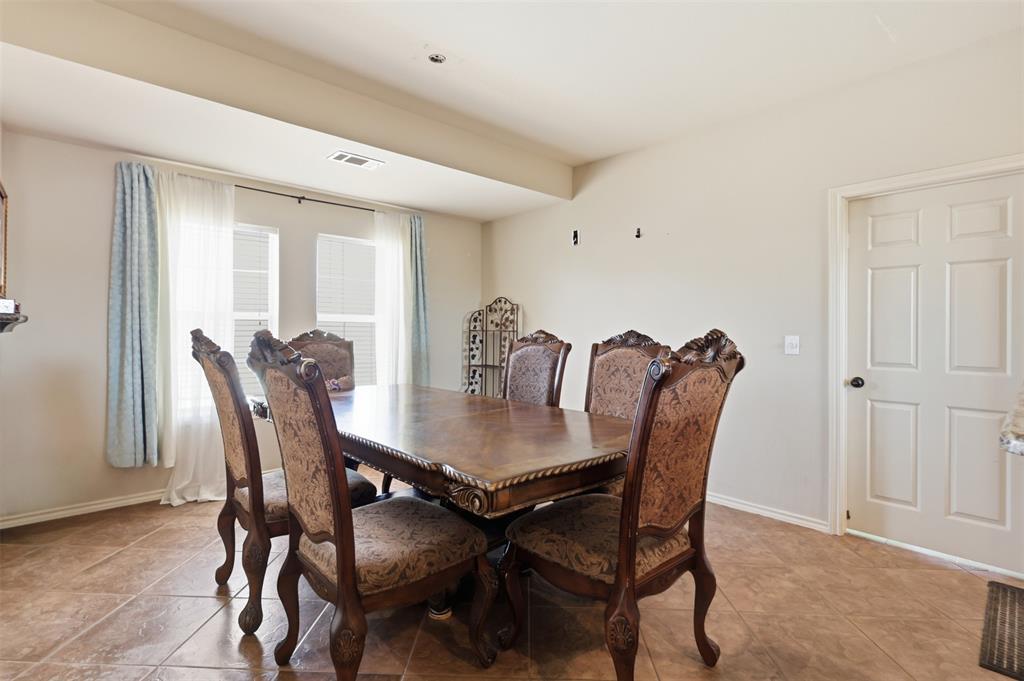 Dining area is large enough to accommodate family gatherings.