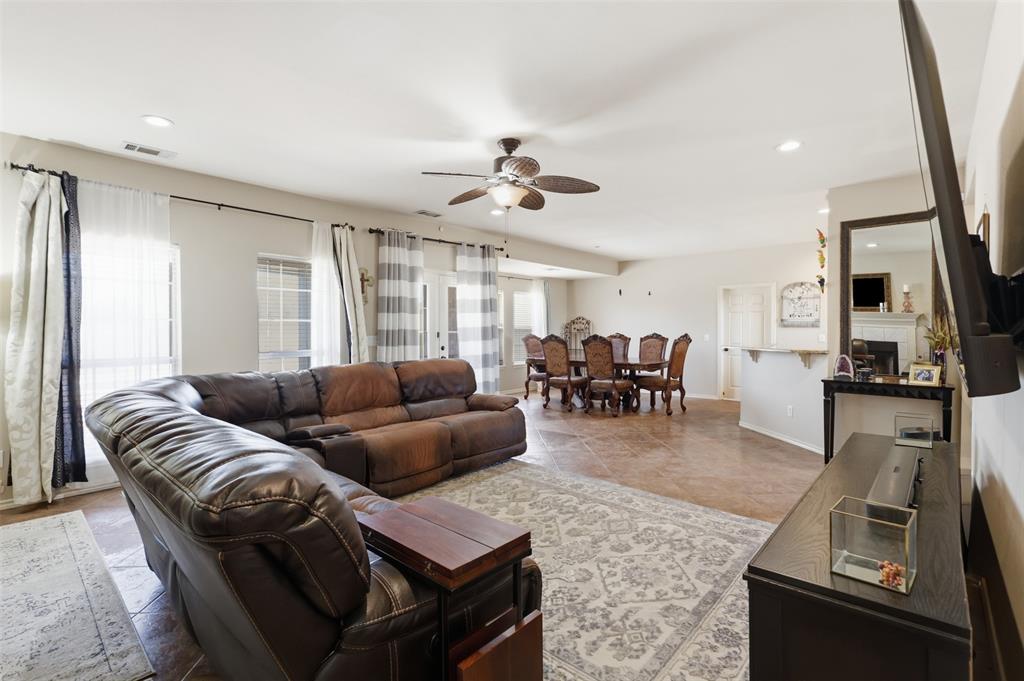 Living Room flows to the dining room and kitchen allowing for seamless entertaining.