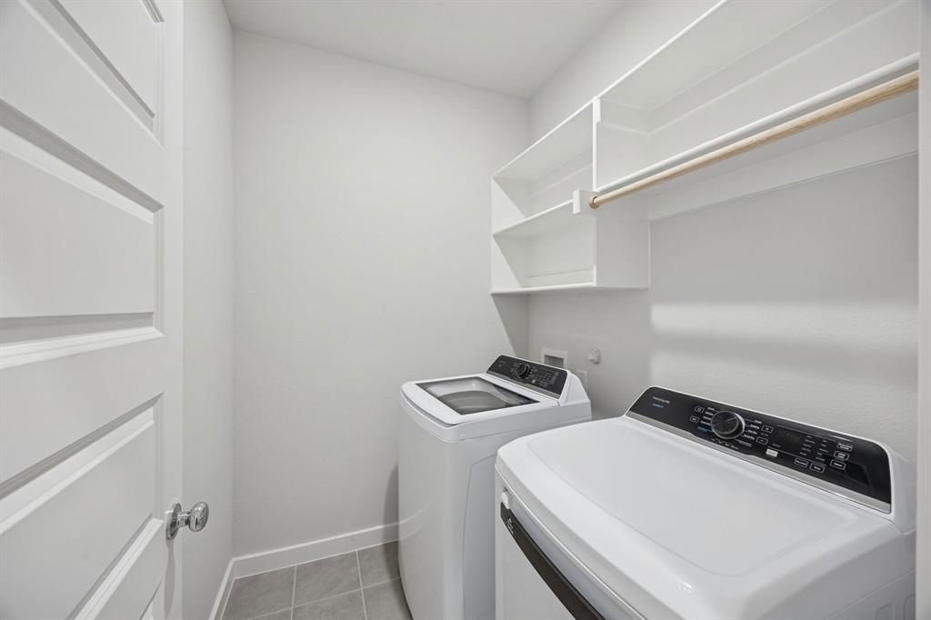 Utility room in the Oak II home plan by Trophy Signature Homes – REPRESENTATIVE PHOTO