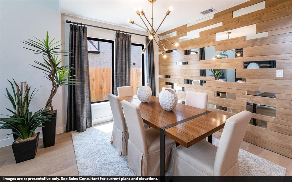 Wood-finish flooring, accent wall with wood-finish panels and reflective inserts, contemporary chandelier, and large windows with dark drapery Wood-finish flooring, accent wall with wood-finish panels and reflective inserts, contemporary chandelier, and large windows with dark drapery