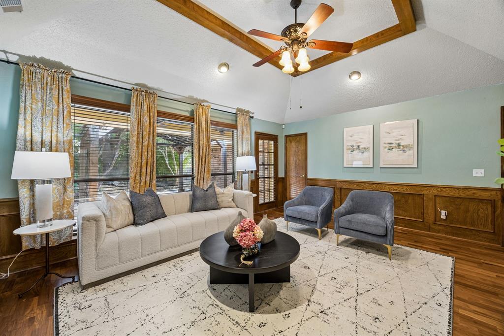 The second living room has views of the backyard and a large walk-in closet.