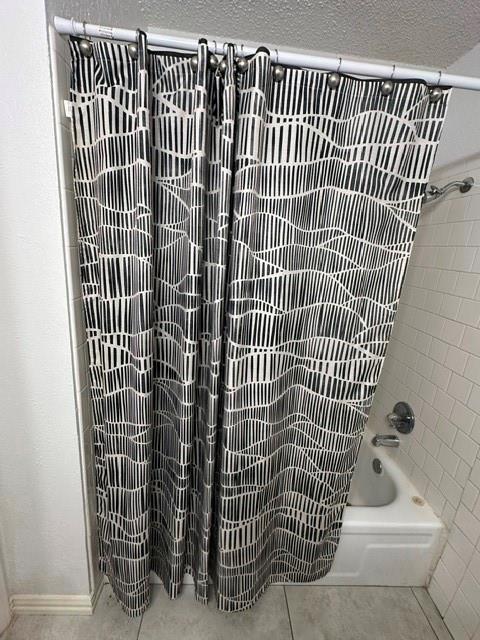 Guest Bathroom with tub in hallway