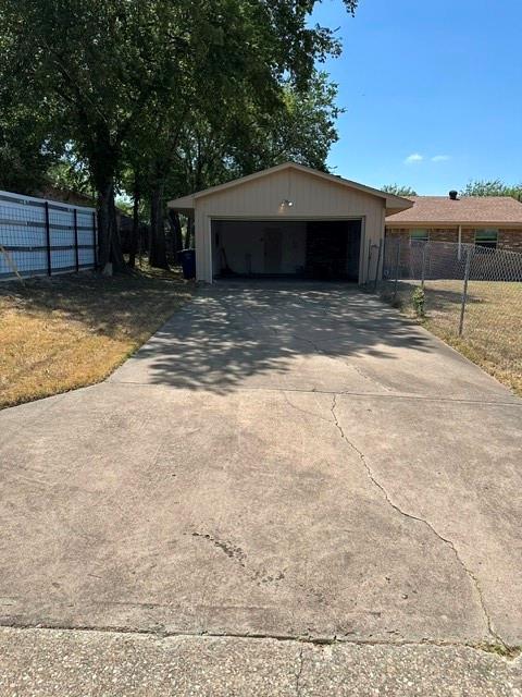 Attached two-car garage with real entry driveway