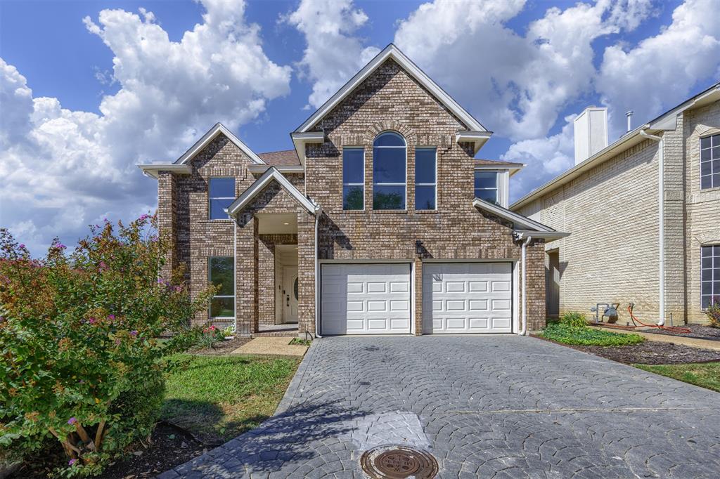 The two garage doors have Chamberlain quiet belt drive, two remote openers and one exterior keypad for each door, interior motion lighting with bluetooth cameras.