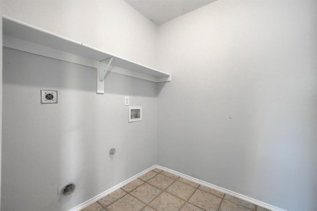 Utility connections, integrated shelving, and tile flooring