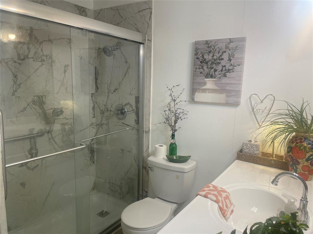 Bathroom with walk-in shower Bathroom with walk-in shower