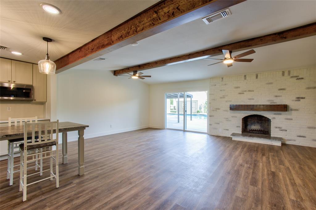 View into the Living Room & Look at the Brick Wood Burning Fireplace