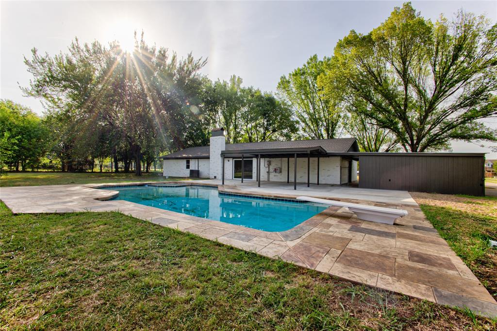 Outdoor Pool View with Wide Stamped Apron