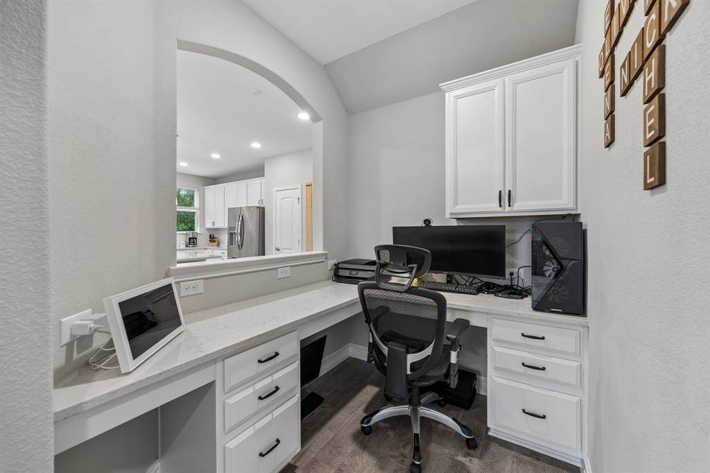 A Pocket Office off the kitchen and Family room is a great place to keep the household organized