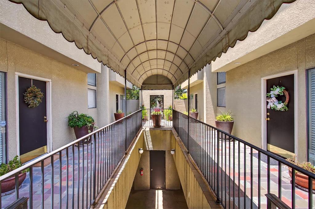 Courtyard and stairs to garage downstairs.