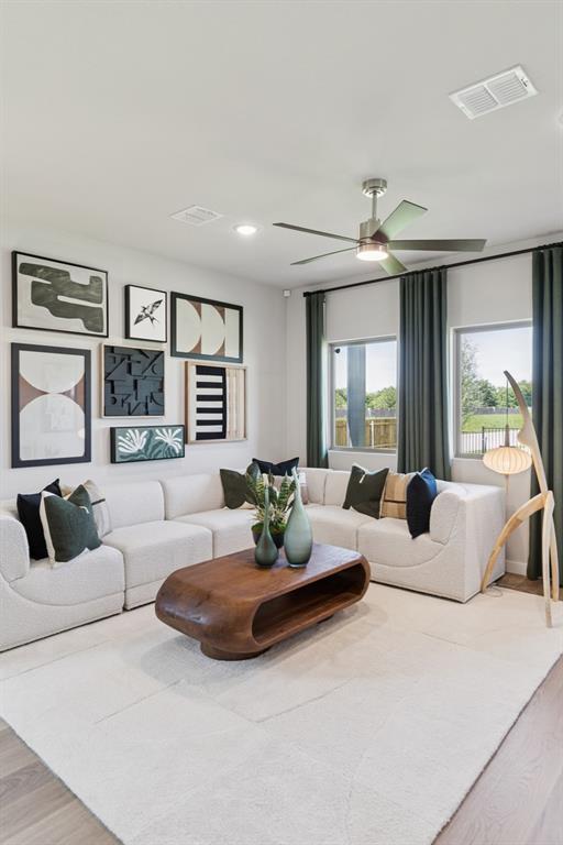Living Room in the Magnolia home plan by Trophy Signature Homes – REPRESENTATIVE PHOTO Living Room in the Magnolia home plan by Trophy Signature Homes – REPRESENTATIVE PHOTO