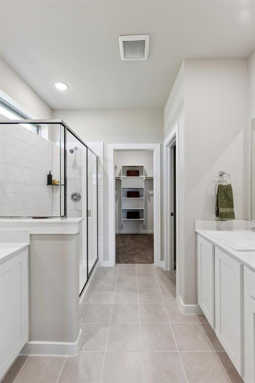 Primary Bathroom in the Magnolia home plan by Trophy Signature Homes – REPRESENTATIVE PHOTO