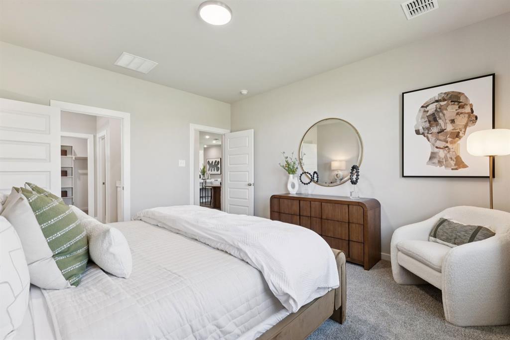 Primary Suite in the Magnolia home plan by Trophy Signature Homes – REPRESENTATIVE PHOTO