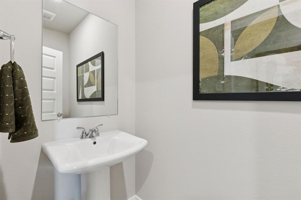 Bathroom in the Magnolia home plan by Trophy Signature Homes – REPRESENTATIVE PHOTO