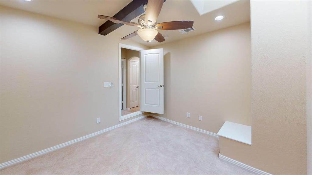 Wall-to-wall carpeting, recessed lighting, and a ceiling fan with integrated light
