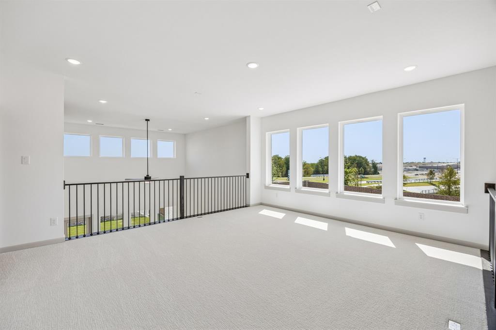 Spacious and bright, this game room offers endless family fun time!