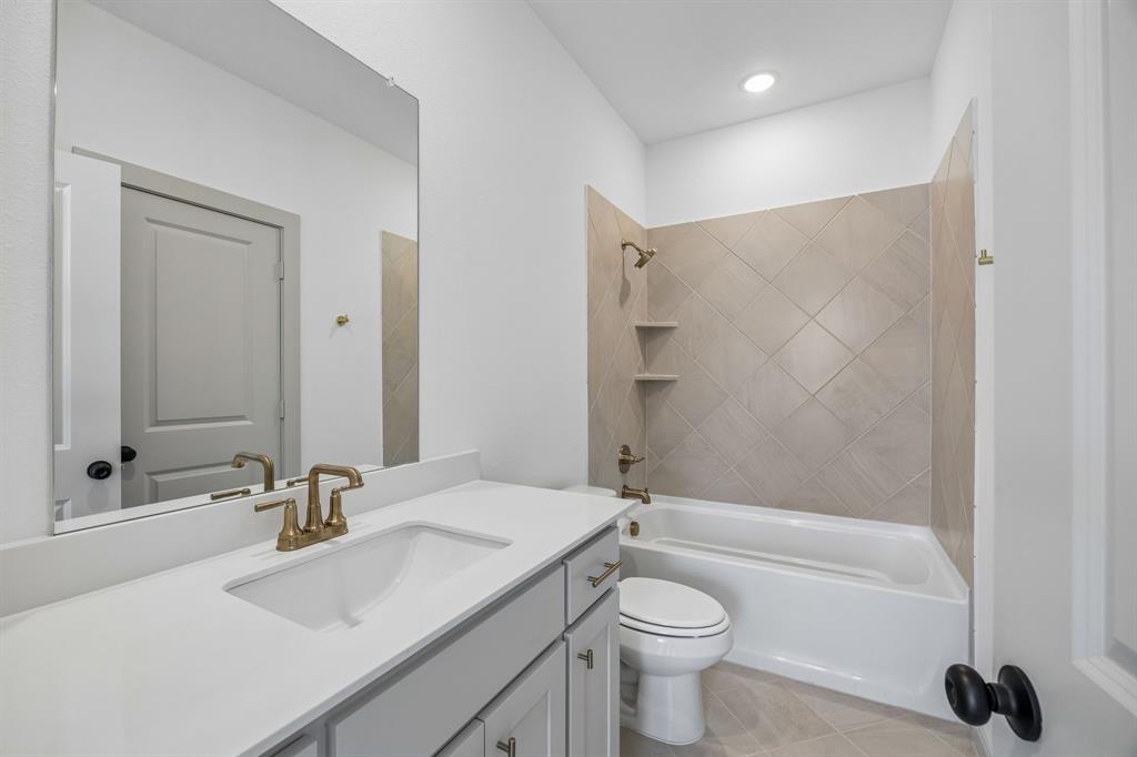 Friends and family will feel right at home in any of the beautifully finished guest baths.