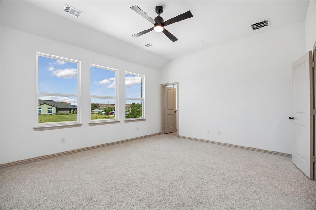 An owner's suite that offers gorgeous finishes, high ceilings, tons of natural light....our Boyd floor plan has it all!