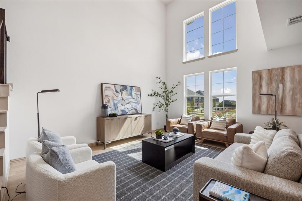 Featuring volume windows in the family room, this beautiful home is filled with natural light.