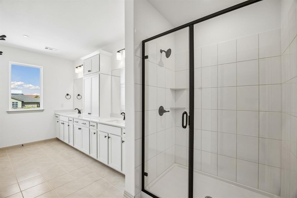 Your new owner's bath comes complete with an oversized, walk in shower.