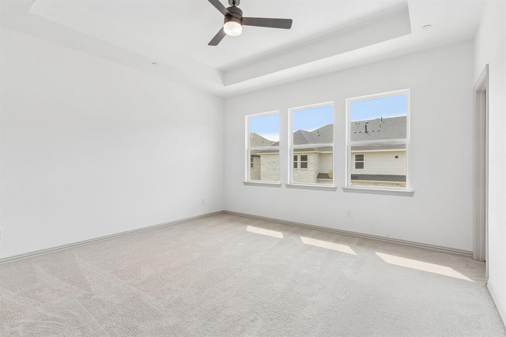 This peaceful and relaxing owner's bedroom is the perfect place for you to unwind at the end of the day.