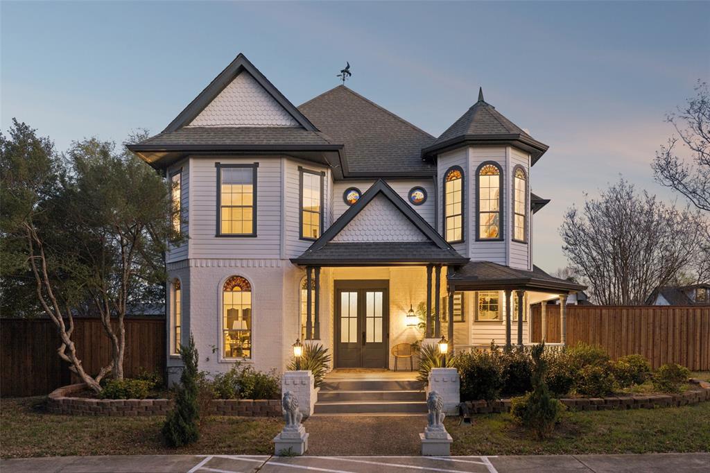 Victorian-style architecture featuring multiple gables and a turret