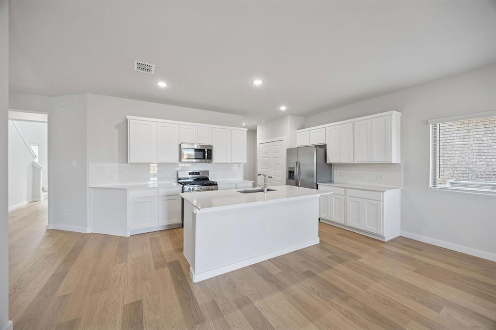 Kitchen in the Oak II home plan by Trophy Signature Homes – REPRESENTATIVE PHOTO Kitchen in the Oak II home plan by Trophy Signature Homes – REPRESENTATIVE PHOTO