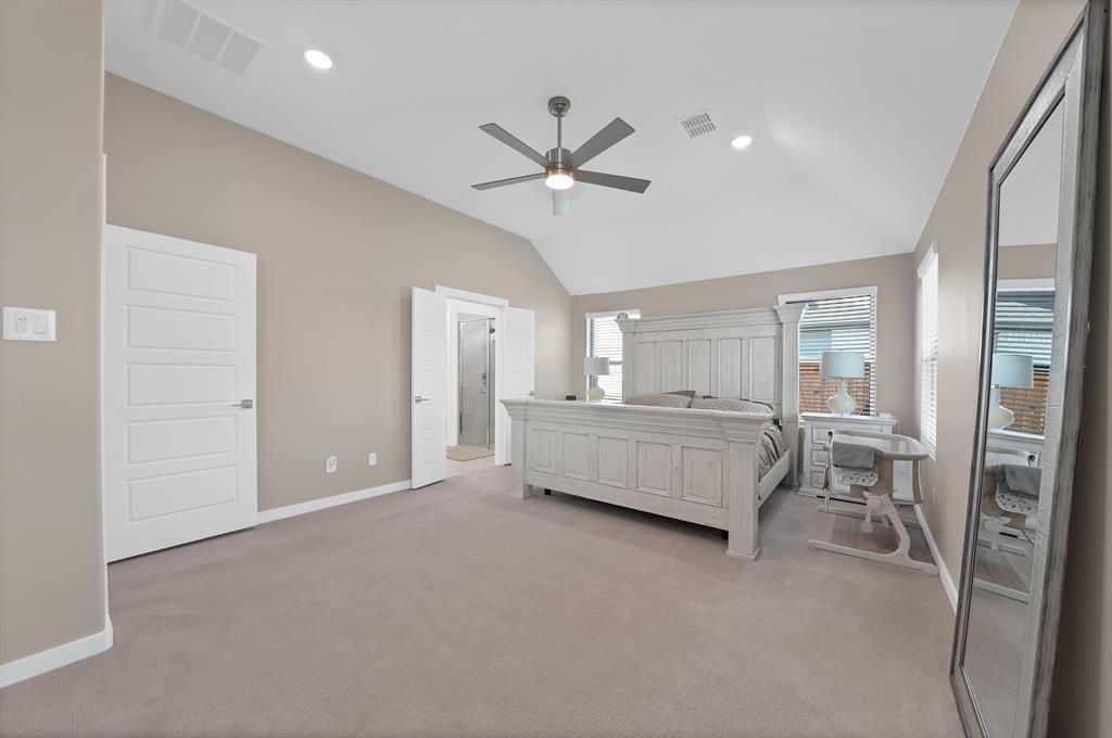 Another view of the primary bedroom.