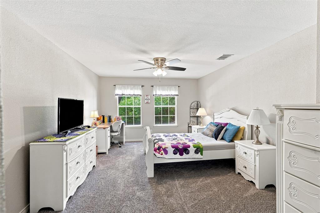 This room is very spacious, it can be a secondary primary bedroom, it has walk in closet, and a full bathroom next to the room