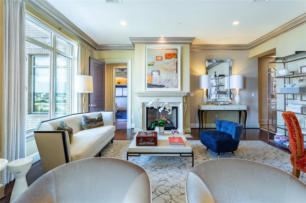 Marble Fireplace anchors one Living Area