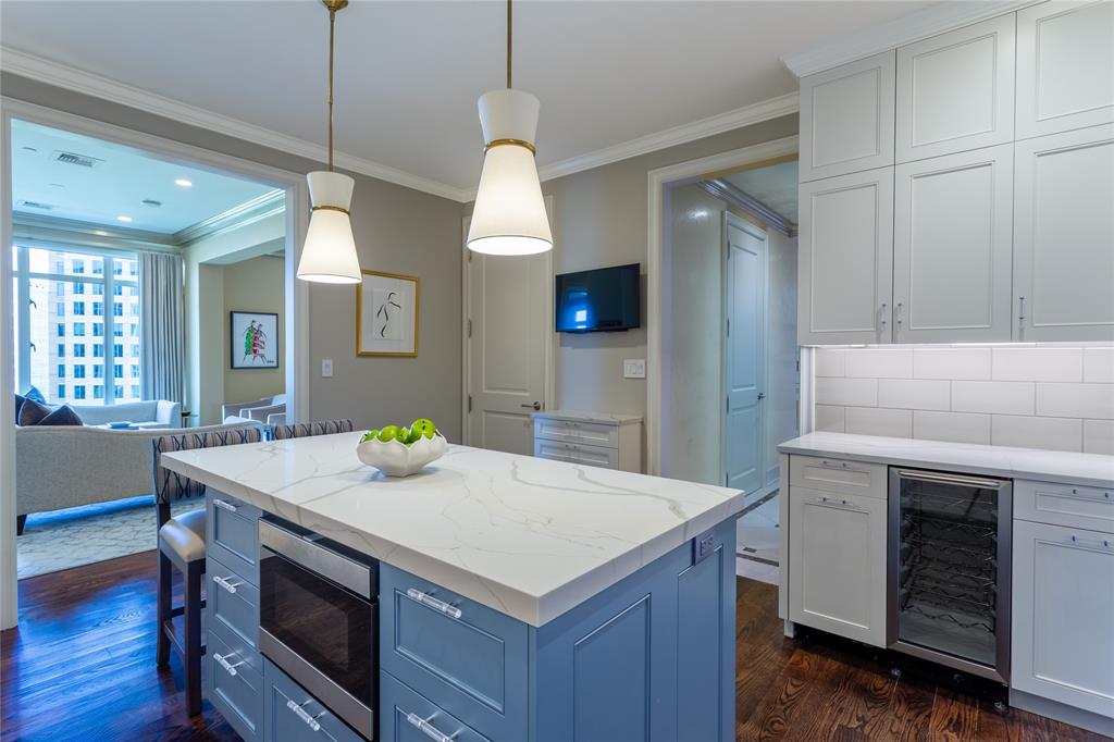 Microwave drawer & wine refrigerator, glass cabinet pulls, and a perfect place for a Bar.