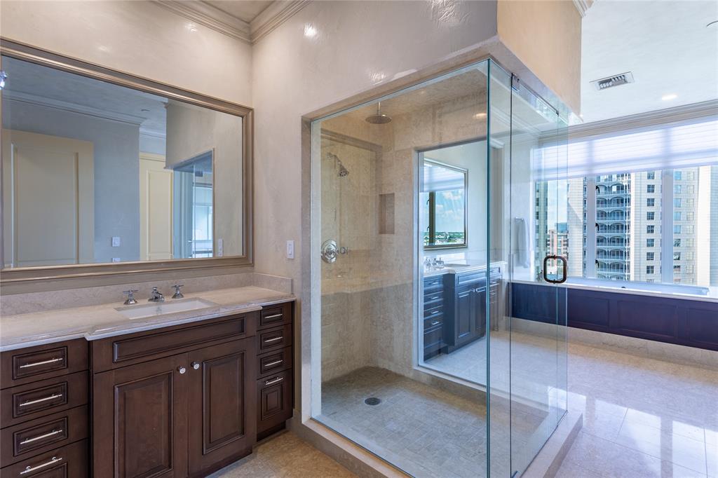 Primary Bath has dual vanities and dual water closets.