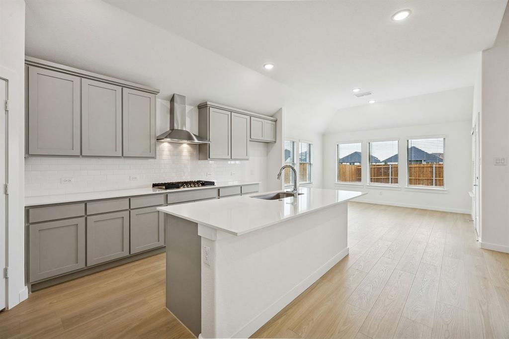 Kitchen in the Gilmour II home plan by Trophy Signature Homes – REPRESENTATIVE PHOTO Kitchen in the Gilmour II home plan by Trophy Signature Homes – REPRESENTATIVE PHOTO