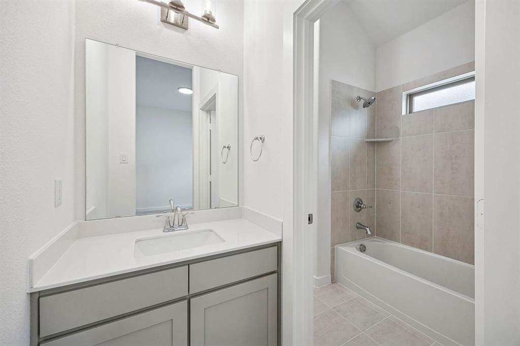 Bathroom in the Gilmour II home plan by Trophy Signature Homes – REPRESENTATIVE PHOTO