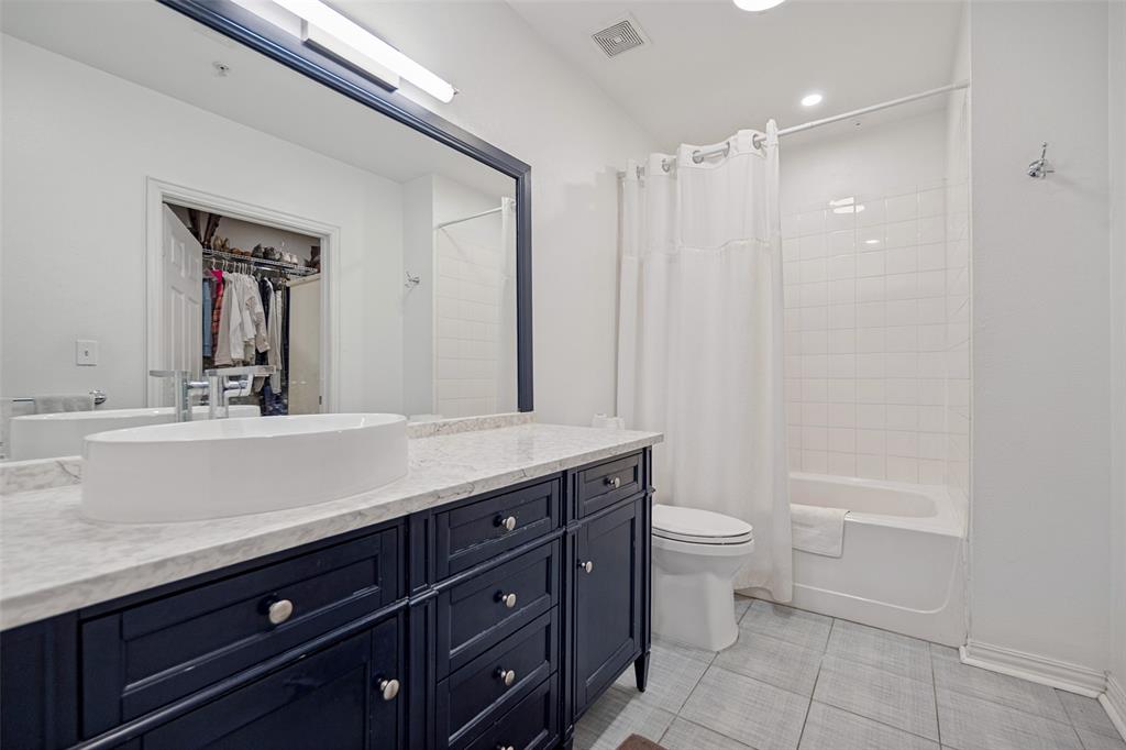 Resort style primary bathroom with good storage!