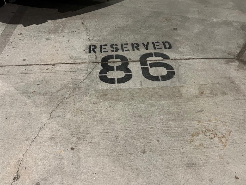 Gated garage parking and side-by-side assigned spots.